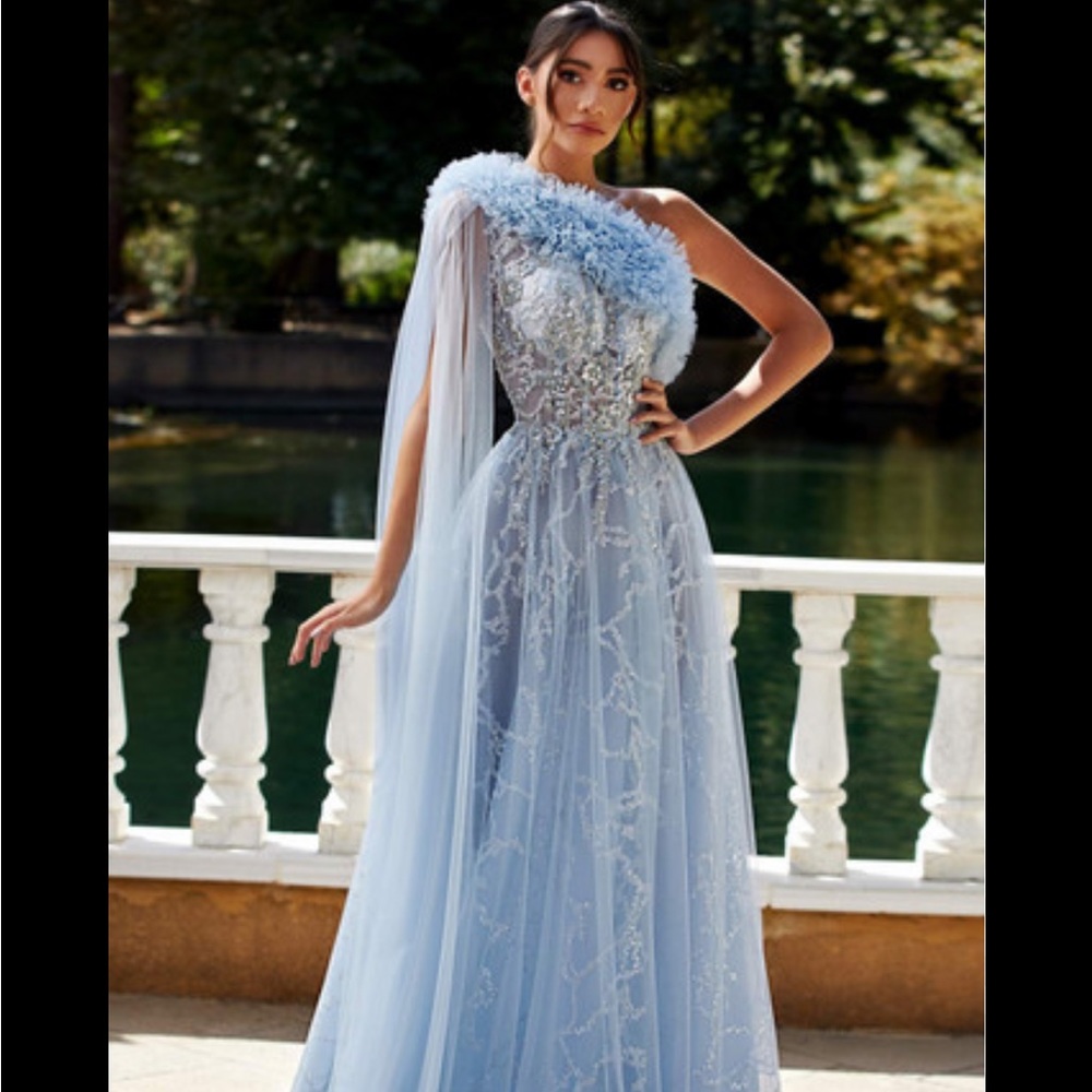MNM COUTURE
One Shoulder Cape Sleeve Gown